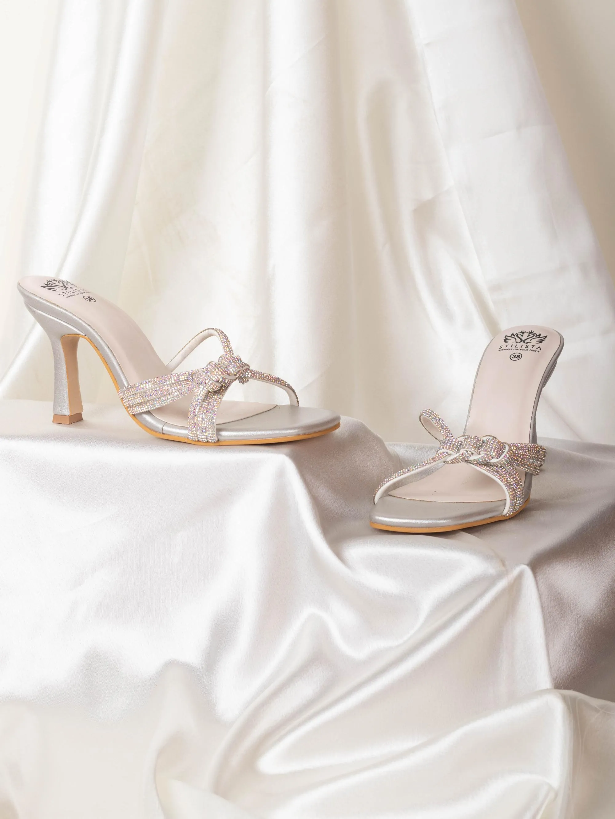 Braided silver pointed heels