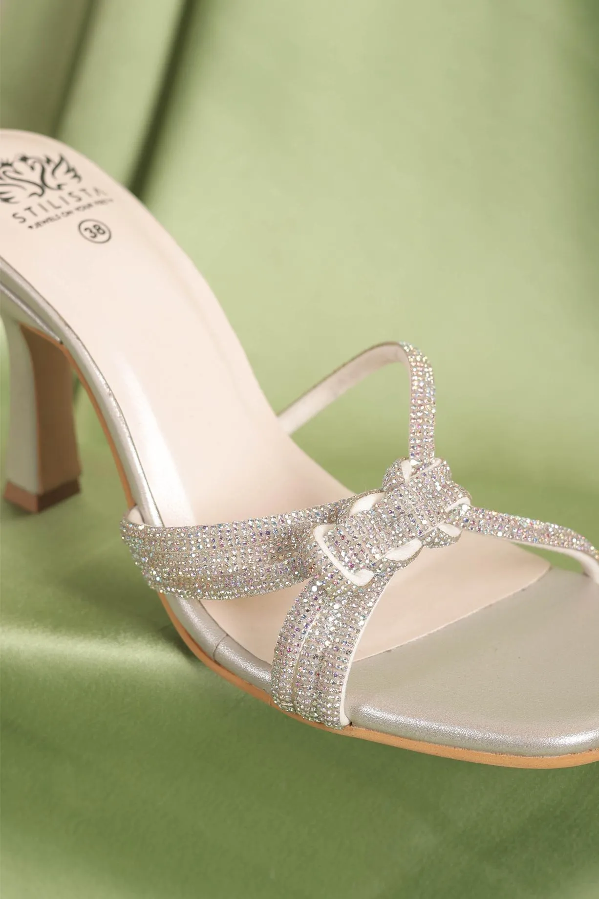 Braided silver pointed heels