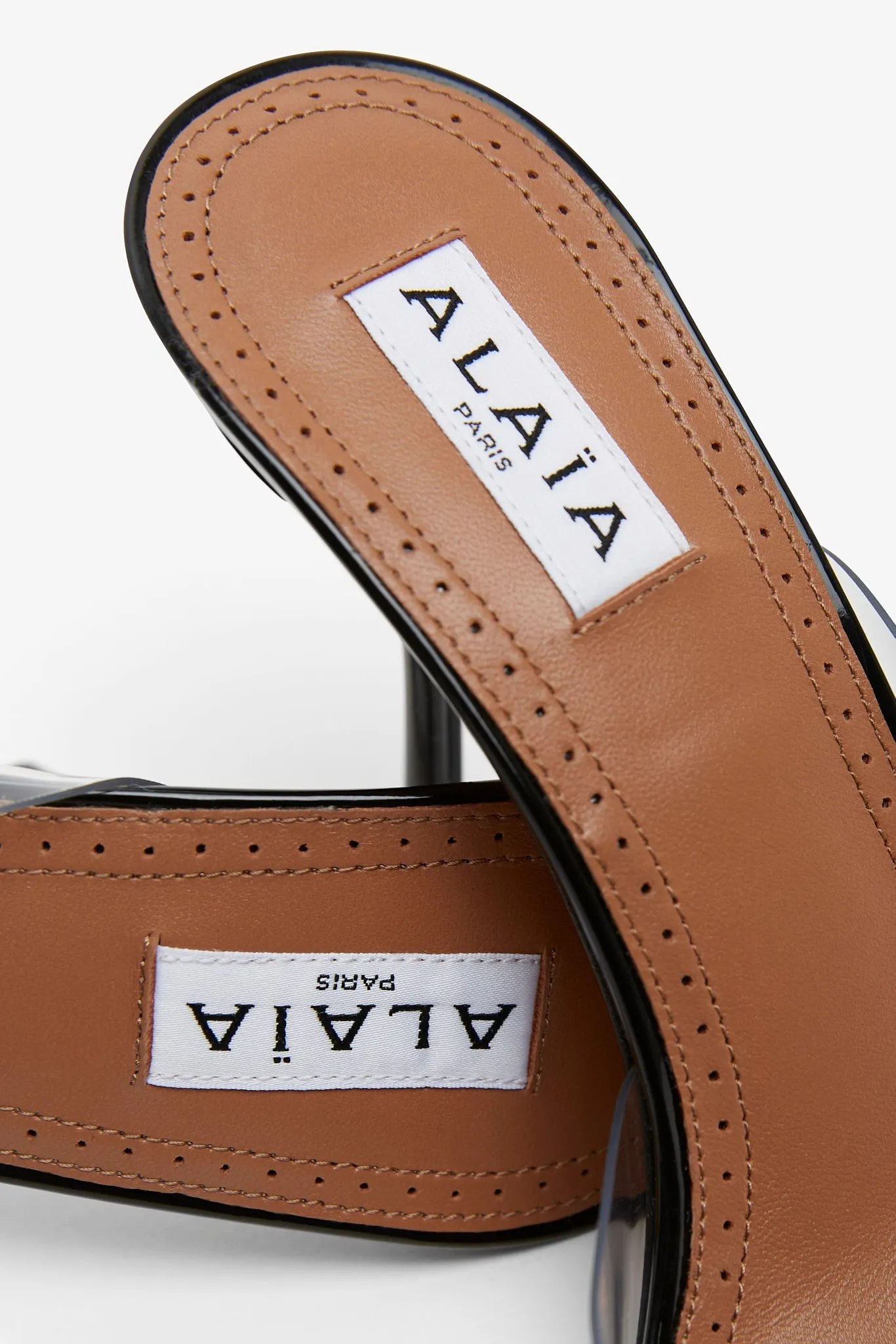 Coeur abstrait patent leather mules